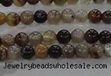 CAA1035 15.5 inches 4mm round dragon veins agate beads wholesale