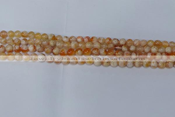 CAA1071 15.5 inches 6mm round sakura agate gemstone beads