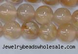 CAA1073 15.5 inches 10mm round sakura agate gemstone beads