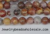 CAA1220 15.5 inches 4mm round gold mountain agate beads