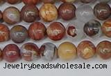 CAA1221 15.5 inches 6mm round gold mountain agate beads