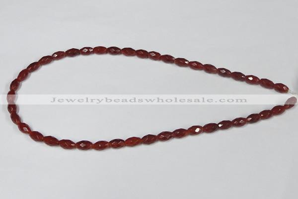 CAA124 15.5 inches 6*10mm faceted rice red agate gemstone beads