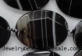 CAA282 15.5 inches 30*40mm faceted oval black line agate beads