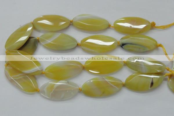 CAA325 15.5 inches 25*50mm faceted marquise yellow line agate beads