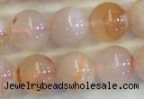 CAA3643 15.5 inches 6mm round sakura agate beads wholesale