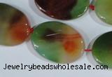 CAG1064 15.5 inches 22*30mm twisted oval rainbow agate beads