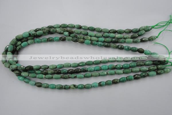 CAG1605 15.5 inches 6*9mm faceted rice green grass agate beads