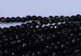 CAG2312 15.5 inches 4mm faceted round black line agate beads