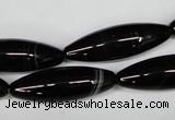 CAG2969 15.5 inches 10*30mm rice black line agate beads