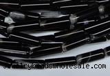 CAG2974 15.5 inches 4*14mm tube black line agate beads