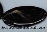 CAG3015 15.5 inches 25*50mm twisted oval black line agate beads