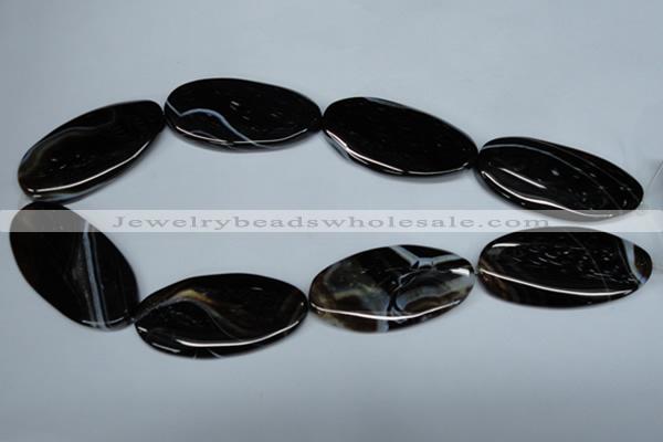 CAG3015 15.5 inches 25*50mm twisted oval black line agate beads