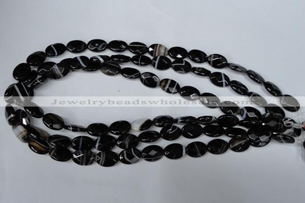 CAG3081 15.5 inches 10*14mm faceted oval black line agate beads