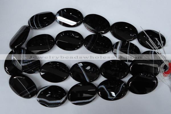 CAG3087 15.5 inches 25*35mm faceted oval black line agate beads