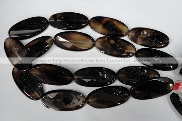 CAG3091 15.5 inches 25*50mm faceted oval black line agate beads