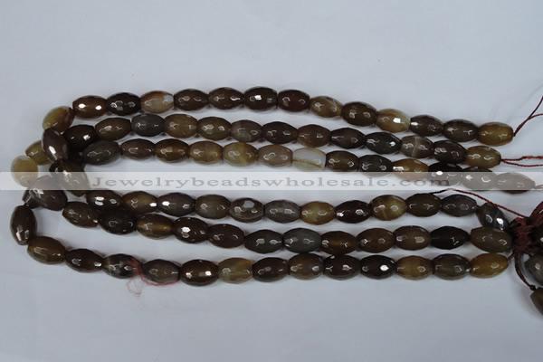 CAG3129 15.5 inches 10*14mm faceted rice brown line agate beads