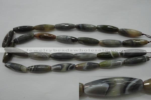 CAG3958 15.5 inches 10*30mm faceted rice grey botswana agate beads