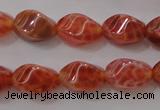 CAG4184 15.5 inches 6*10mm twisted rice natural fire agate beads