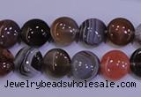 CAG4441 15.5 inches 10mm flat round botswana agate beads wholesale