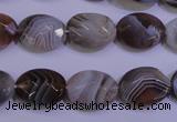 CAG4463 15.5 inches 12*16mm faceted oval botswana agate beads