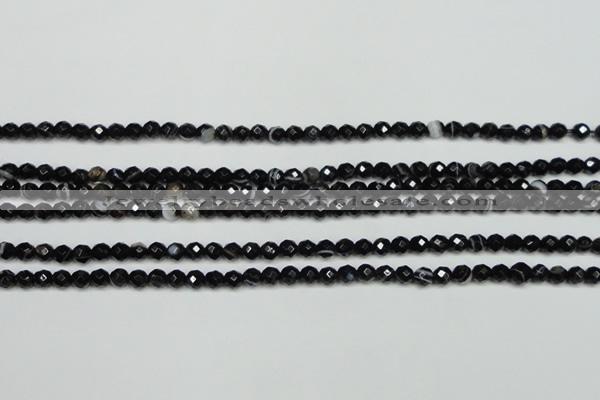 CAG5271 15.5 inches 4mm faceted round black line agate beads