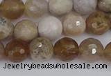 CAG9854 15.5 inches 8mm faceted round ocean fossil agate beads