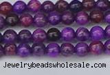 CAG9917 15.5 inches 4mm round purple crazy lace agate beads