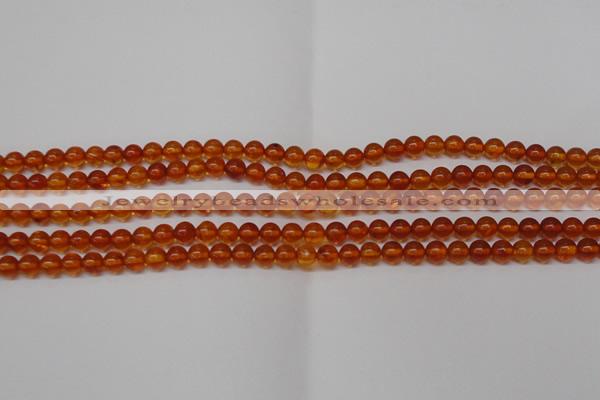 CAR111 15.5 inches 4mm round natural amber beads