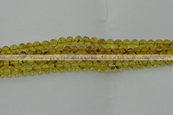 CAR521 15.5 inches 5mm - 6mm round natural amber beads wholesale