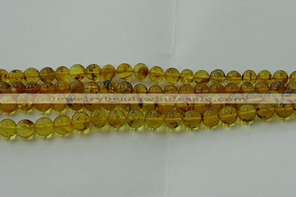 CAR523 15.5 inches 8mm - 9mm round natural amber beads wholesale