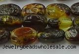 CAR546 15.5 inches 7*11mm - 8*12mm oval natural amber beads