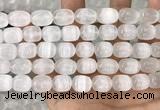 CCA380 15.5 inches 10*12mm rice white calcite gemstone beads