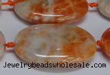 CCA487 15.5 inches 25*35mm oval orange calcite gemstone beads