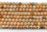 CCA551 15.5 inches 6mm round peach calcite gemstone beads