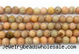 CCA553 15.5 inches 10mm round peach calcite gemstone beads