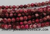 CDE01 15.5 inches 4mm round dyed sea sediment jasper beads