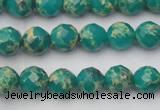 CDE2170 15.5 inches 6mm faceted round dyed sea sediment jasper beads