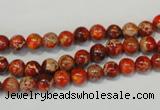 CDE491 15.5 inches 6mm round dyed sea sediment jasper beads