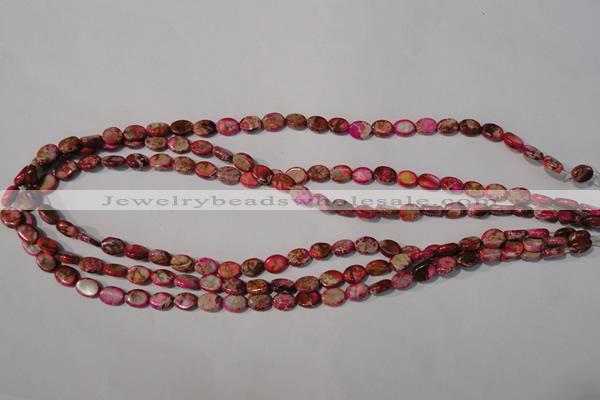 CDE781 15.5 inches 6*8mm oval dyed sea sediment jasper beads