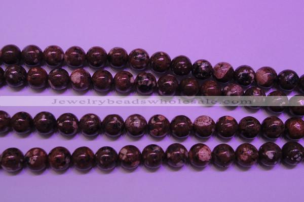 CDM53 15 inches 10mm round strawberry dalmatian jasper beads