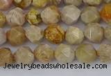 CFC236 15.5 inches 6mm faceted nuggets fossil coral beads