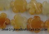 CFG1000 15.5 inches 16mm carved flower yellow jade beads