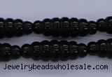 CFG760 15.5 inches 10*30mm carved rice black agate beads