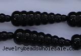 CFG761 15.5 inches 10*35mm carved teardrop black agate beads