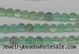 CFL115 15.5 inches 6mm faceted round green fluorite beads