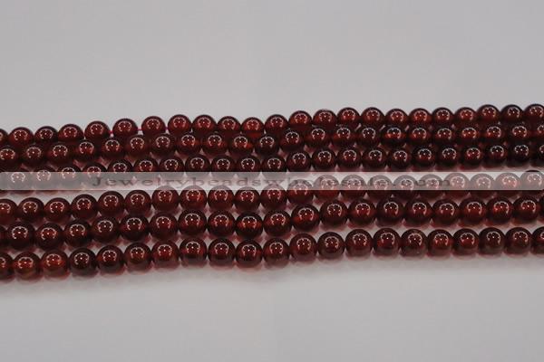 CGA608 15.5 inches 7mm AA grade round natural orange garnet beads