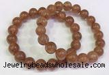 CGB4609 10mm - 11mm round golden rutilated quartz beaded bracelets