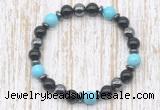 CGB8379 8mm blue howlite, black onyx & hematite energy bracelet