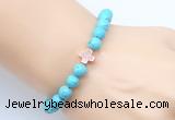 CGB9352 8mm, 10mm blue howlite & cross hematite power beads bracelets