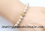 CGB9360 8mm, 10mm white fossil jasper & cross hematite power beads bracelets